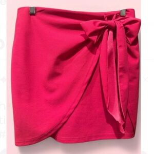 Hot pink faux wrap mini skirt, size medium.